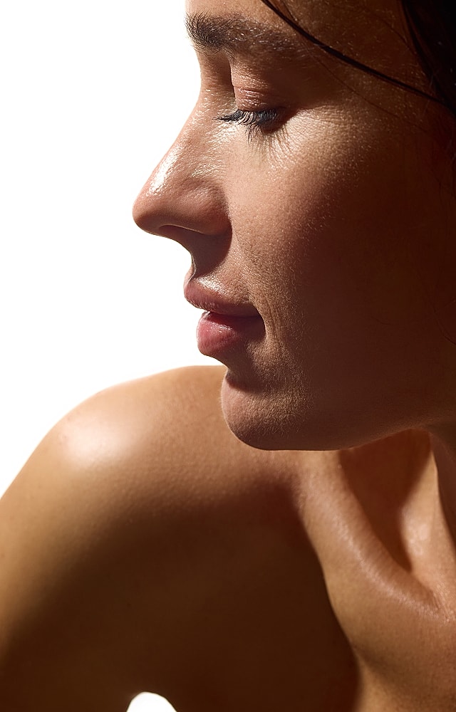 Profile of a woman with smooth skin.